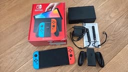 Nintendo Switch OLED spelkonsol neon röd/blå 2024