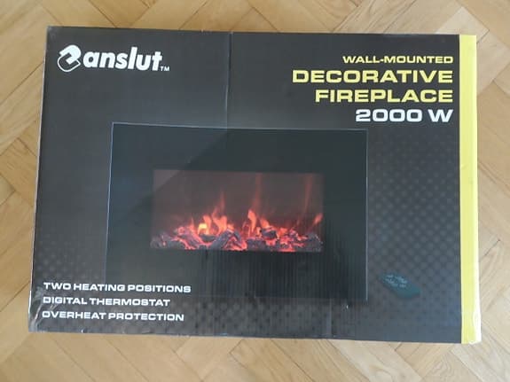 Vägghängd dekorationsbrasa 2000 W  Ny oanvänd