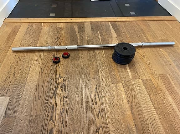 Skivstång med vikter och snabbklämmor