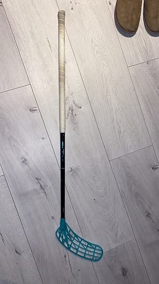 Unihoc innebandyklubba turkos blad