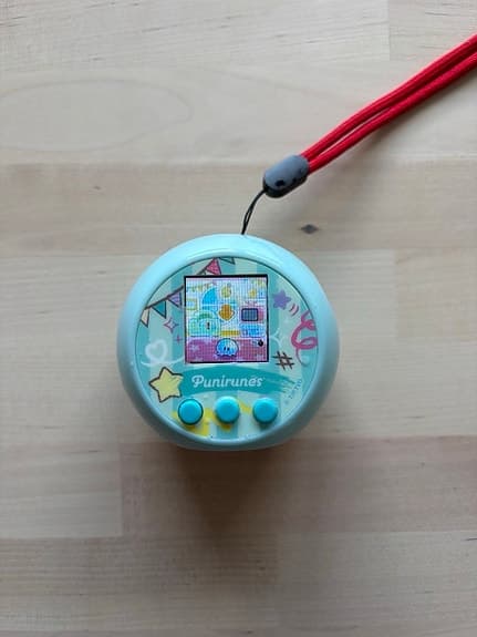 Bandai Punirunes elektroniskt husdjur turkos