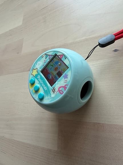 Bandai Punirunes elektroniskt husdjur turkos