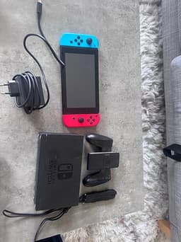 Nintendo Switch spelkonsol neon röd/blå