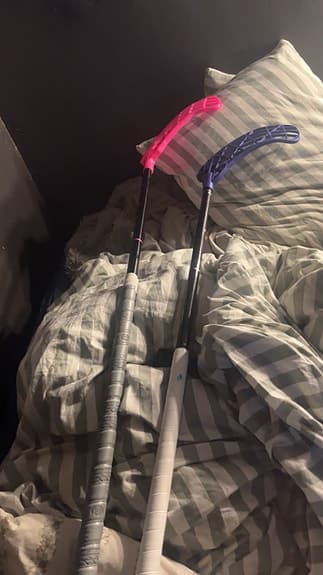 Innebandyklubbor med fodral