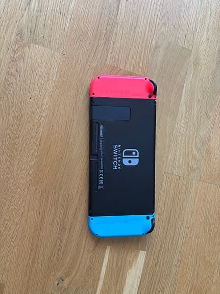 Nintendo Switch spelkonsol neon röd/blå