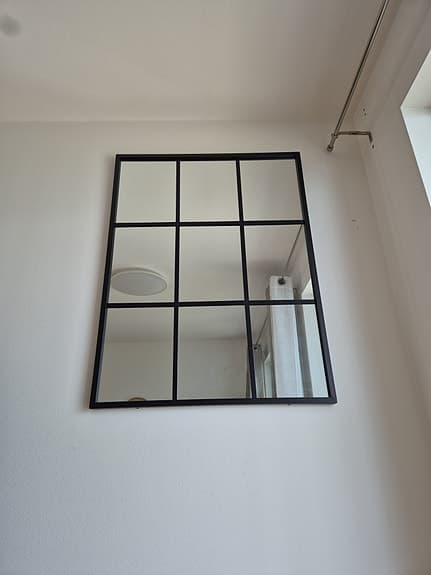 Rusta spegel med svart ram 100x75