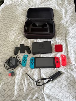 Nintendo Switch spelkonsol med blå/röd Joy-Con