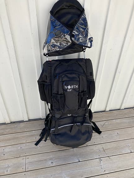 Bärstol för barn med regnskydd