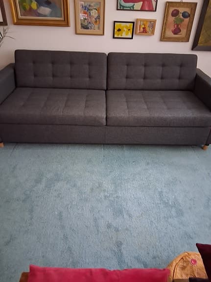 Grå bäddsoffa med förvaring