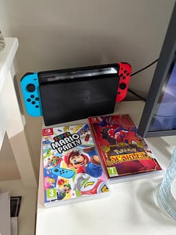 Nintendo Switch spelkonsol neon röd/blå