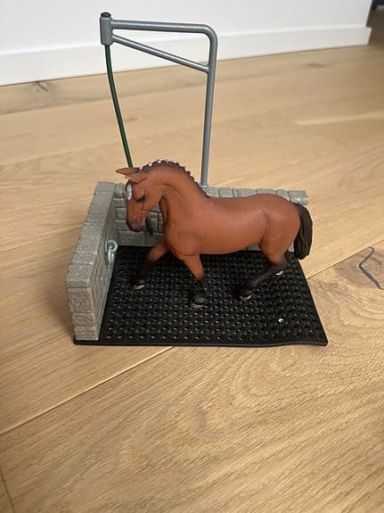 Schleich ryktspilta med häst och ryttare
