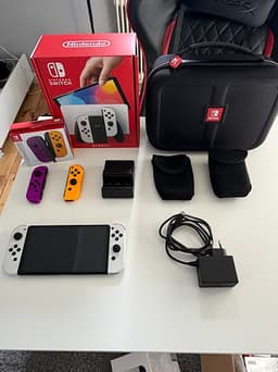 Nintendo Switch OLED i toppskick + Extra Joy-Cons & Deluxe-väska