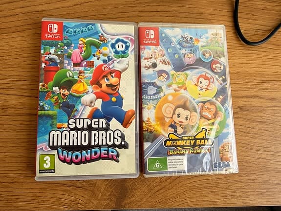 Nintendo Switch OLED + 2 spel och fodral