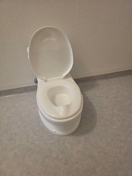 potta med toalettrullehållare