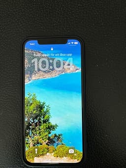 Apple iPhone 12 mobil 64 GB svart