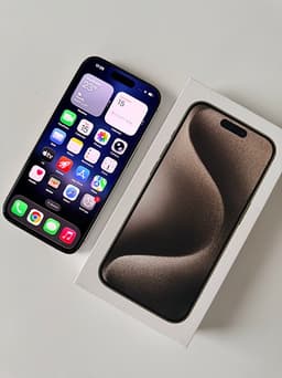 IPhone 15 Pro 128GB – Natural Titanium (Toppskick + Njord-skal)