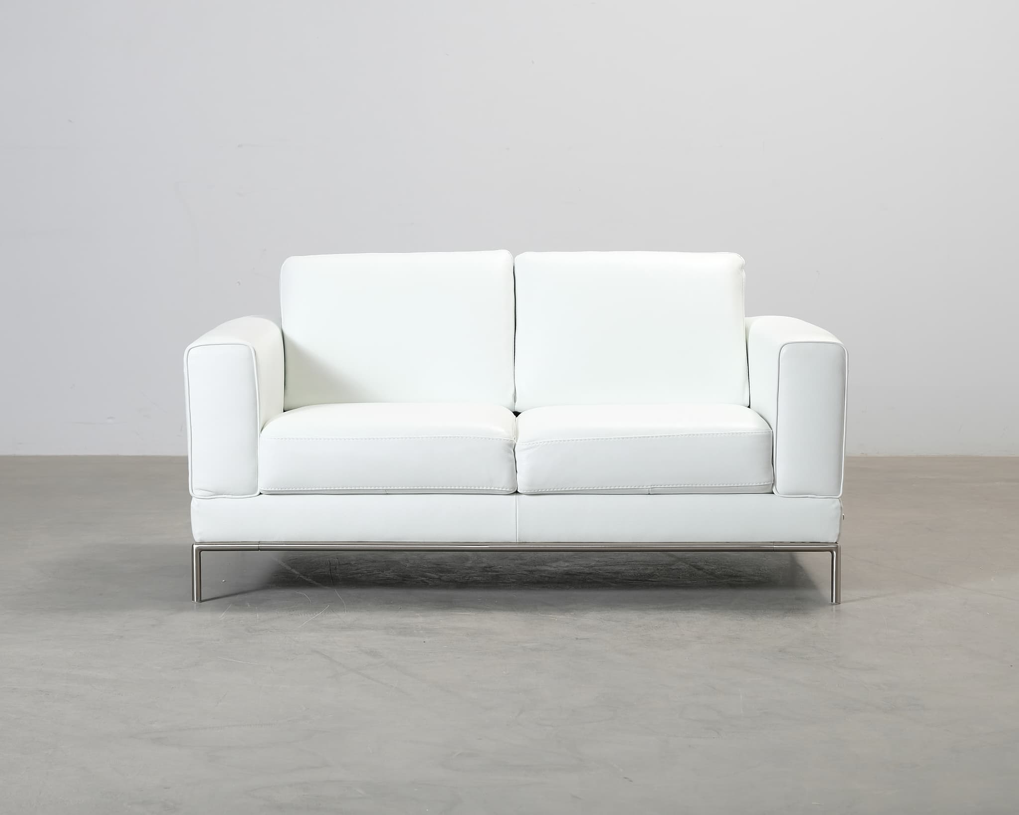 Natuzzi 2-sits lädersoffa vit