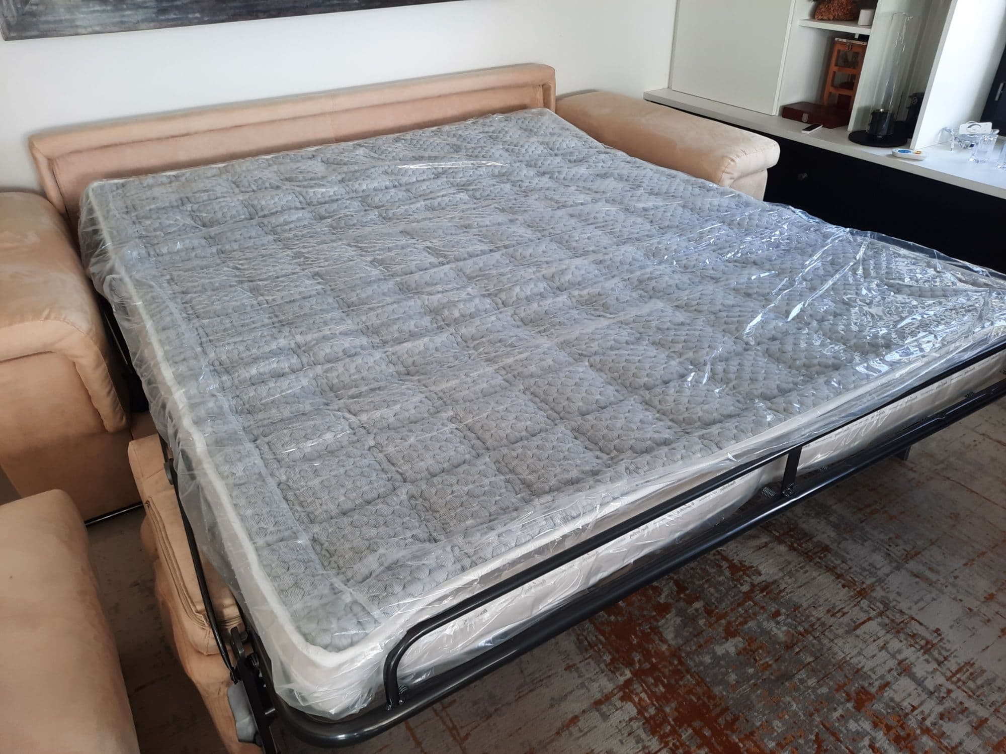 Canapé-lit de 180 x 200 cm, largeur total 250 cm + pouf