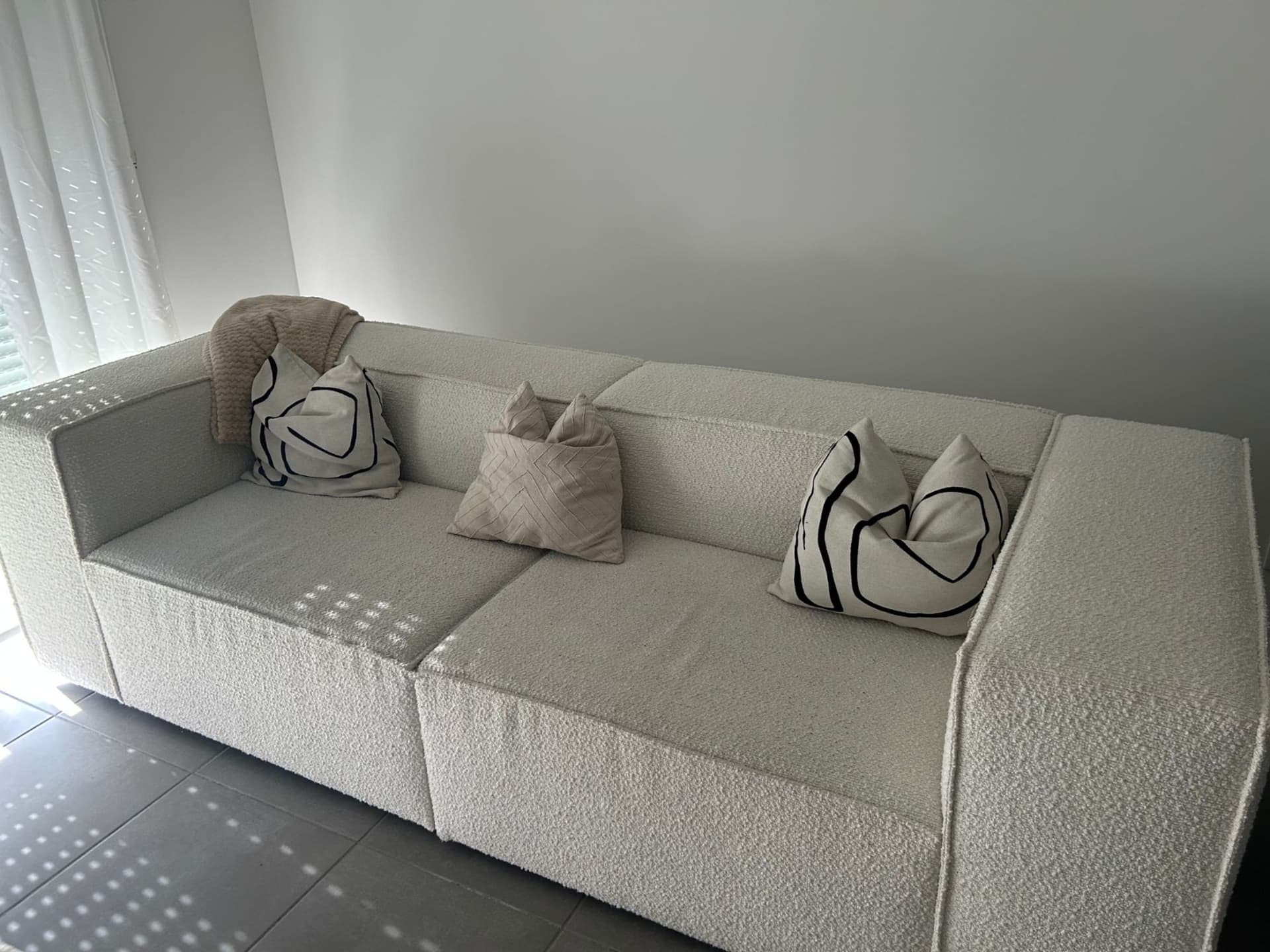 Canapé beige effet bouclette modulable