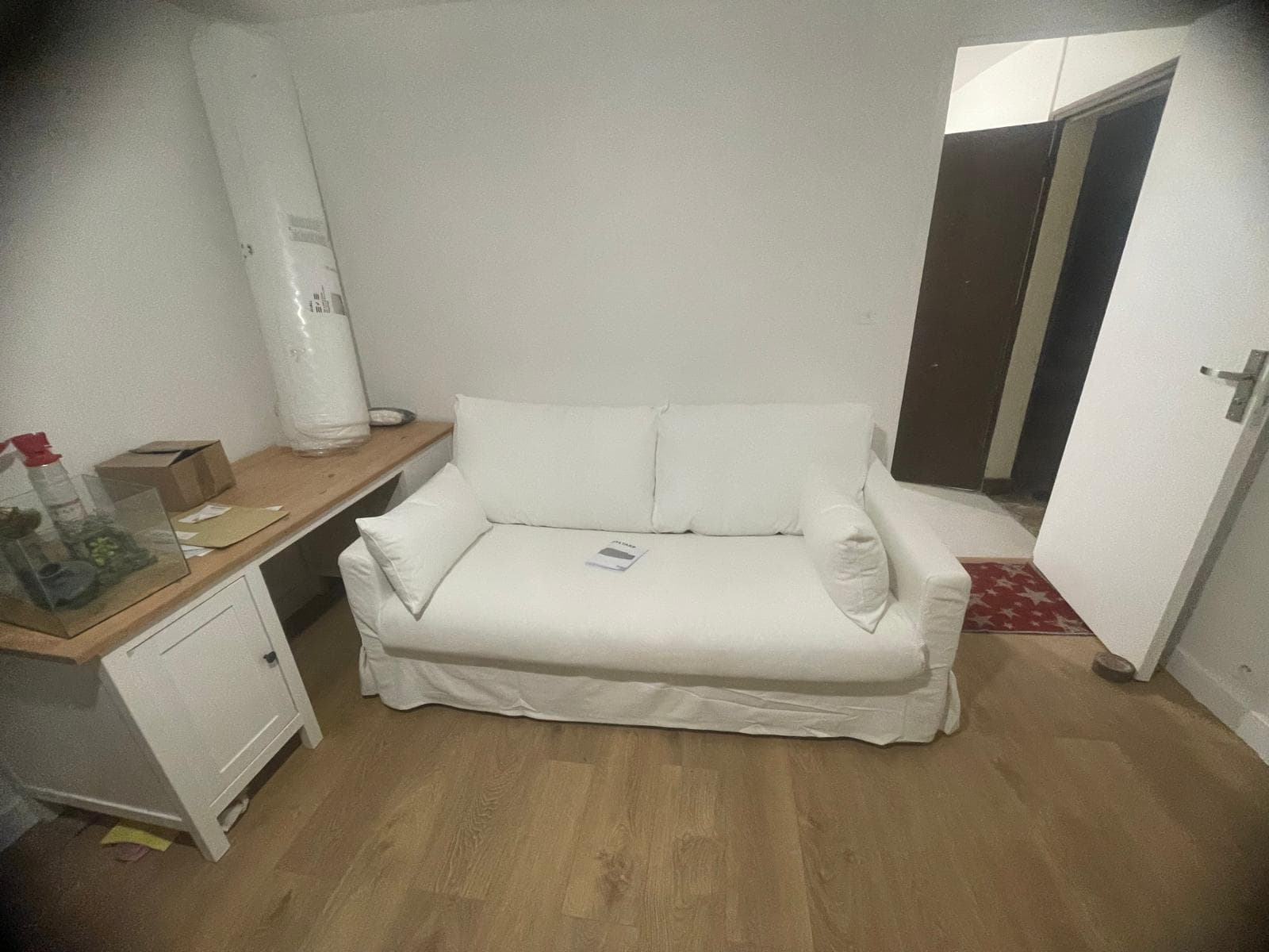 Canapé convertible blanc deux places