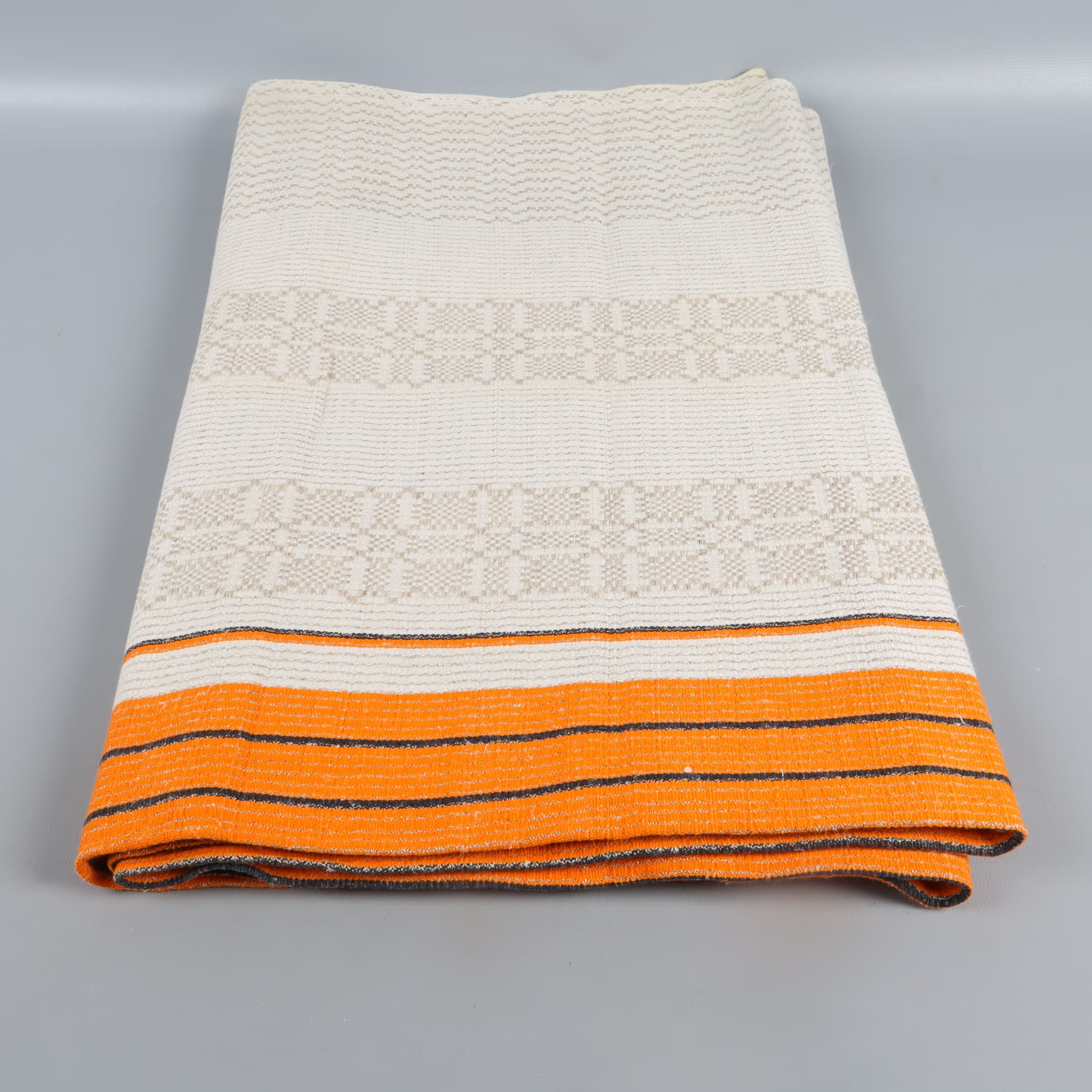 Löpare i beige med orangea ränder