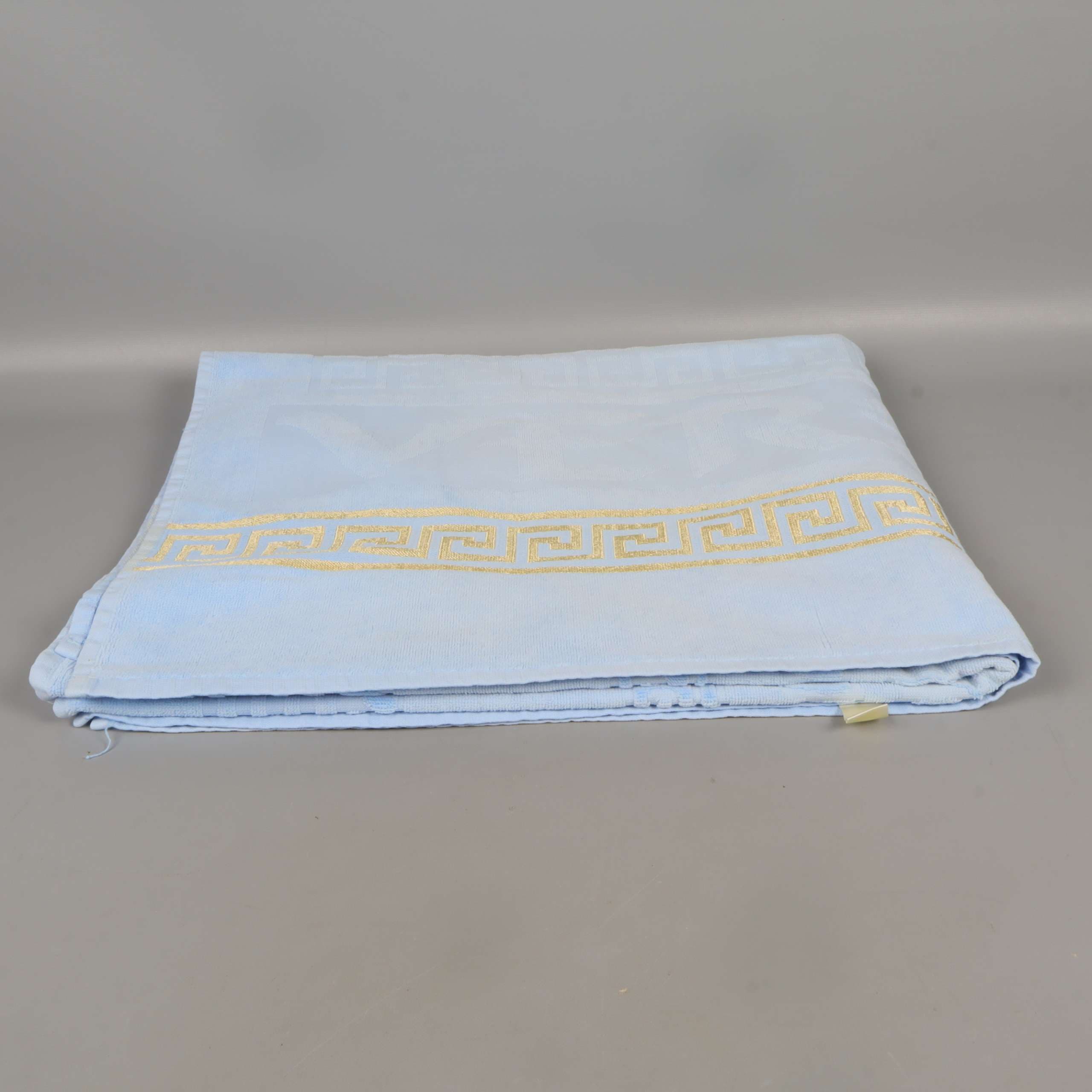 Handduk med dekorbård