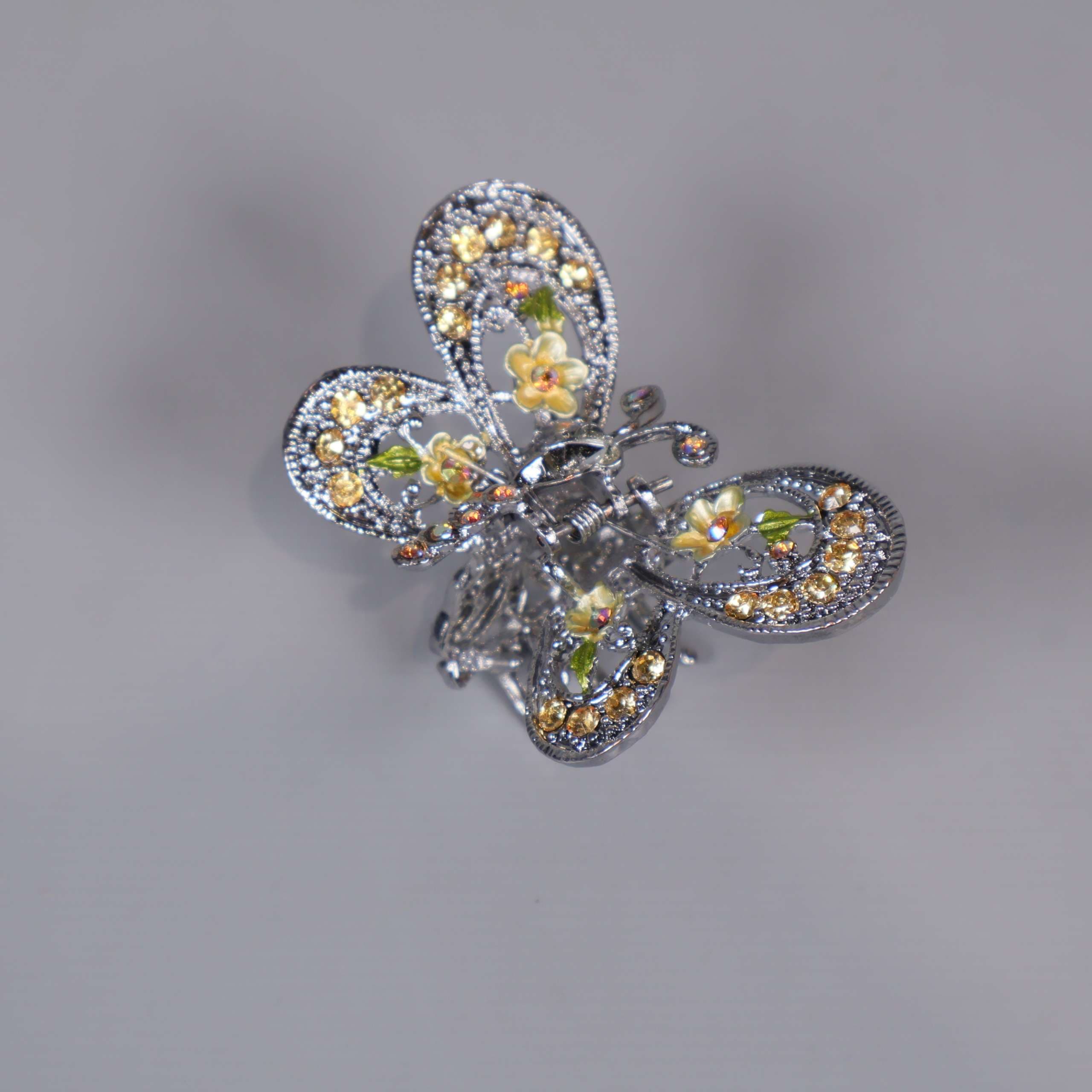 Dekorativ hårklämma med fjärilsmotiv