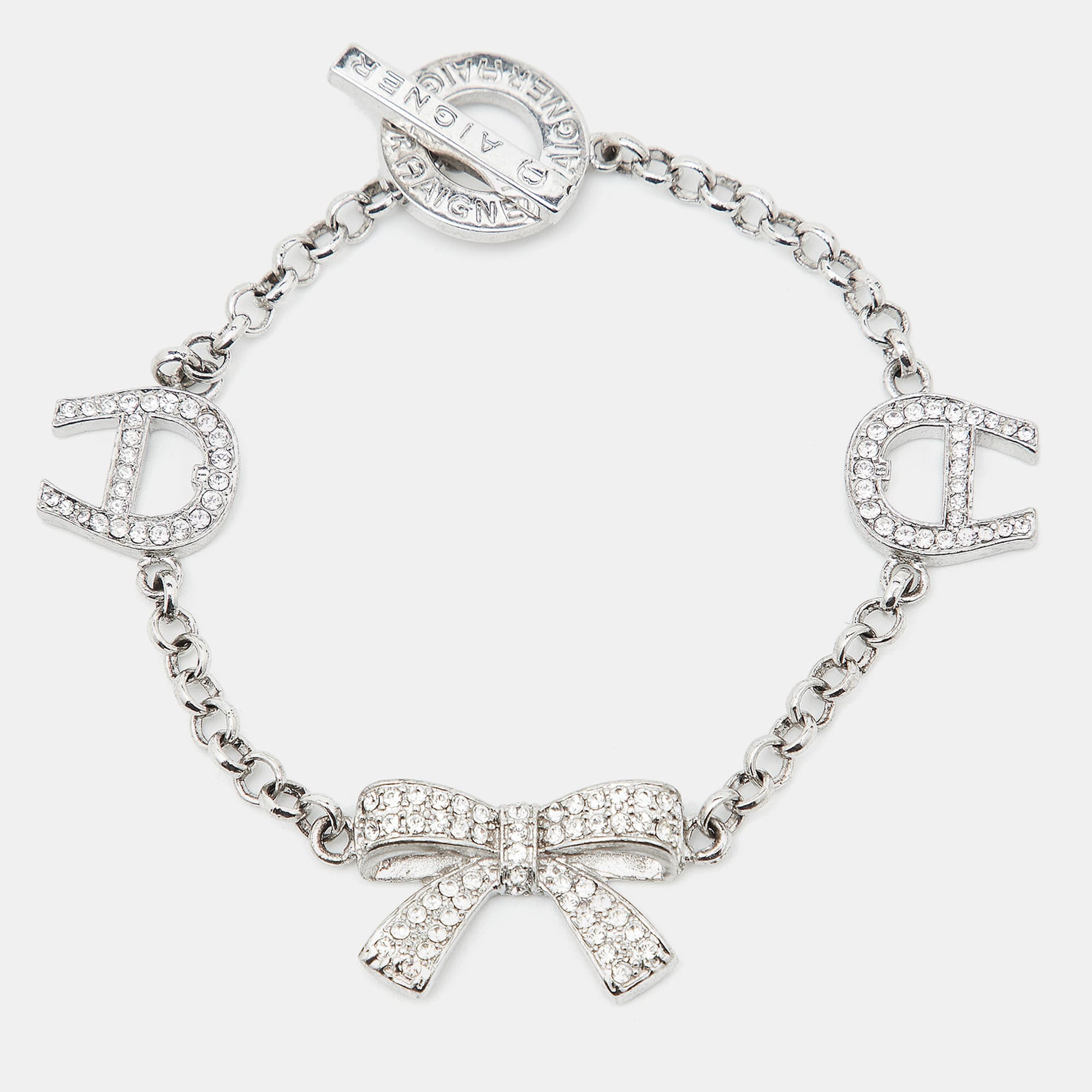 Aigner Logo Bow Crystals Silver Tone Bracelet