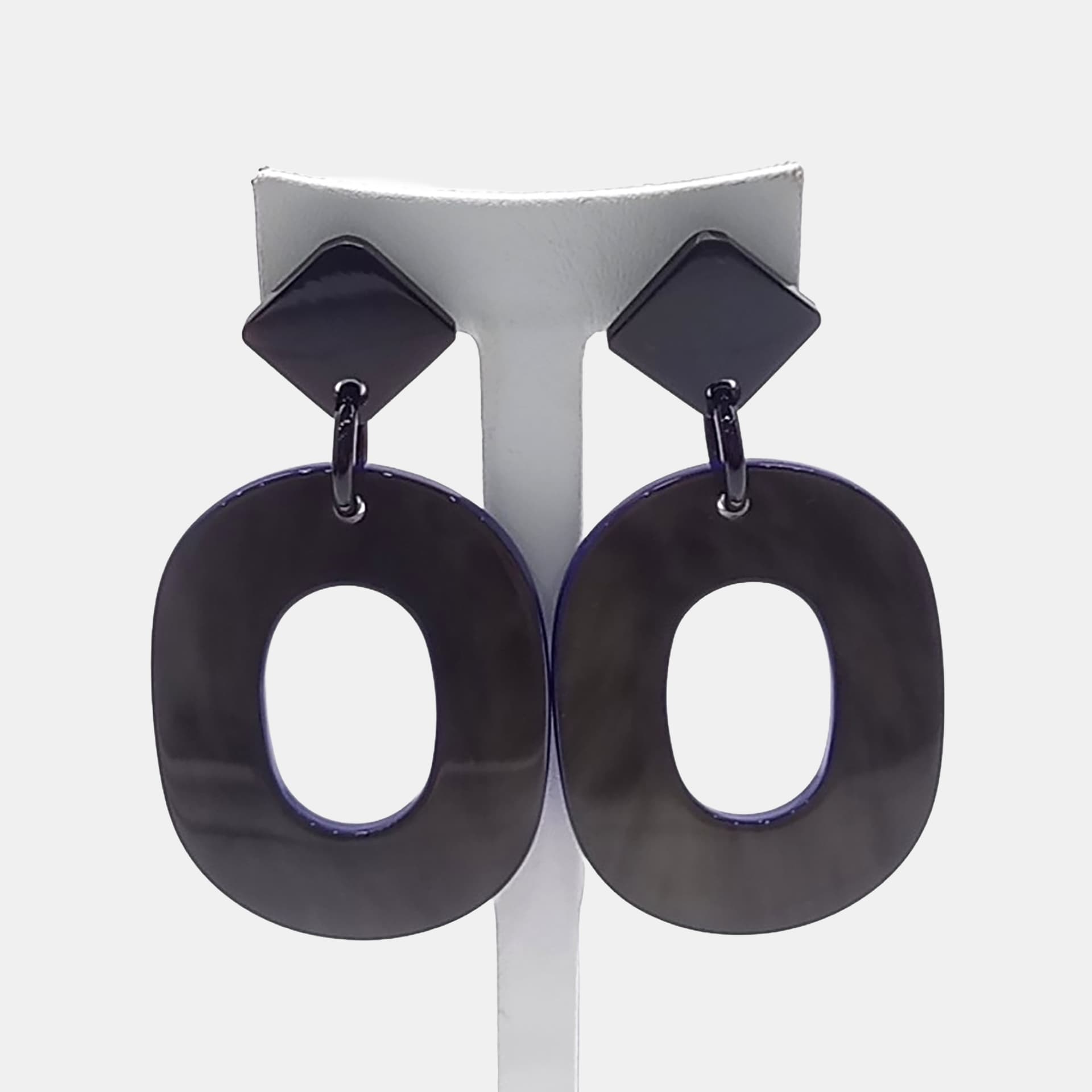 Herm&egrave;s Plastic horn earrings