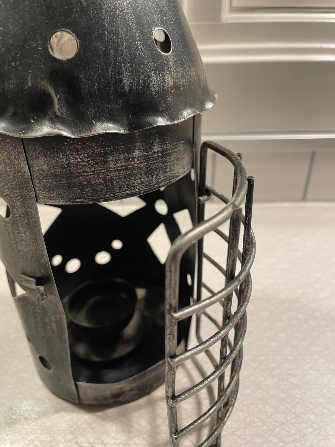 Ljus lyckta smide värmeljus