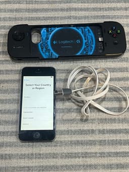 iPhone 5s med Logitech Powershell Från 1993