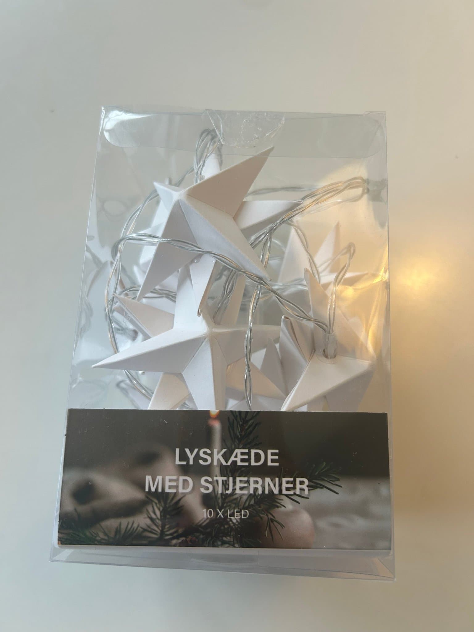 LED ljusslinga med vita stjärnor – 10 lampor, 2 meter