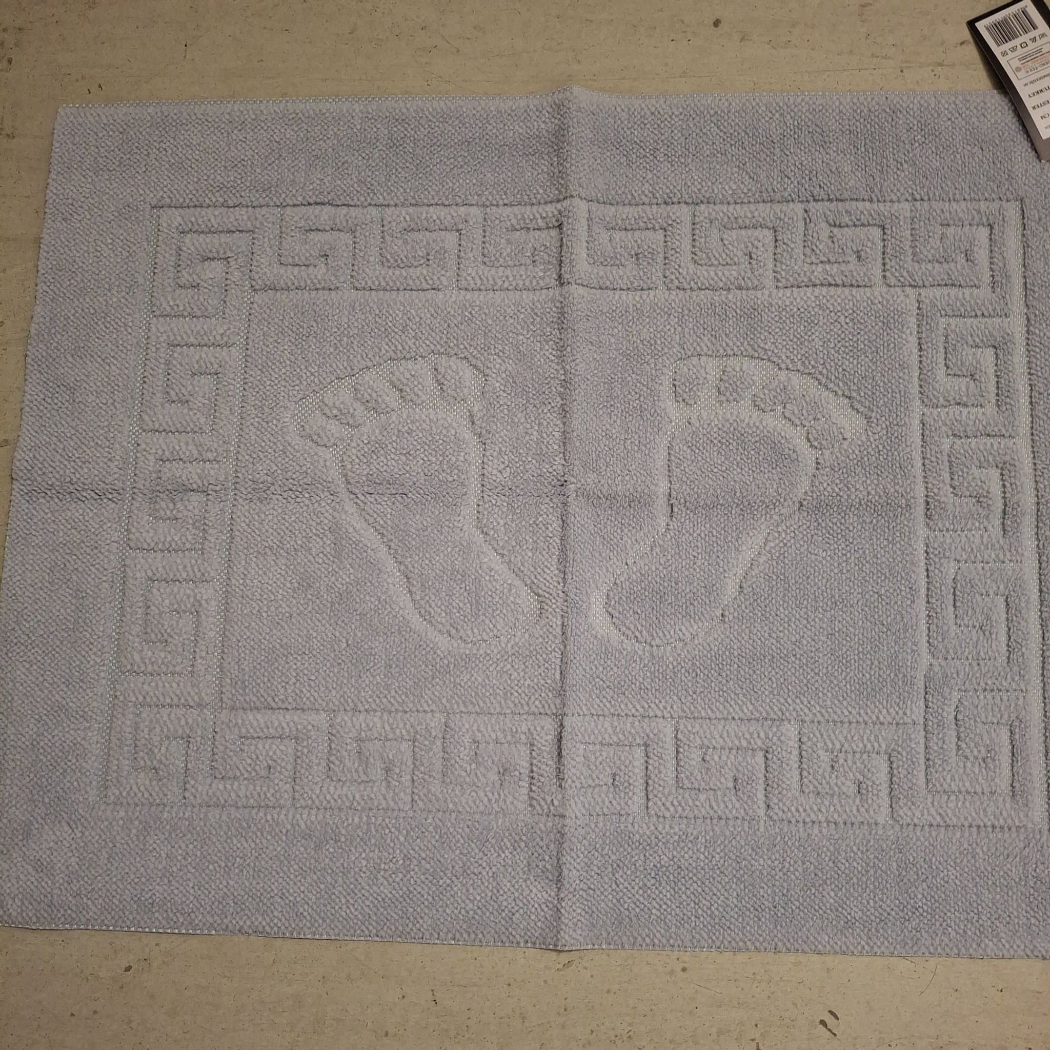 Badrumsmatta storlek 50x70 gummerad baksida helt ny oanvänd