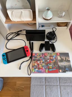 Nintendo Switch (V2) komplett + Mario Kart 8, Mario Odyssey & Hogwarts