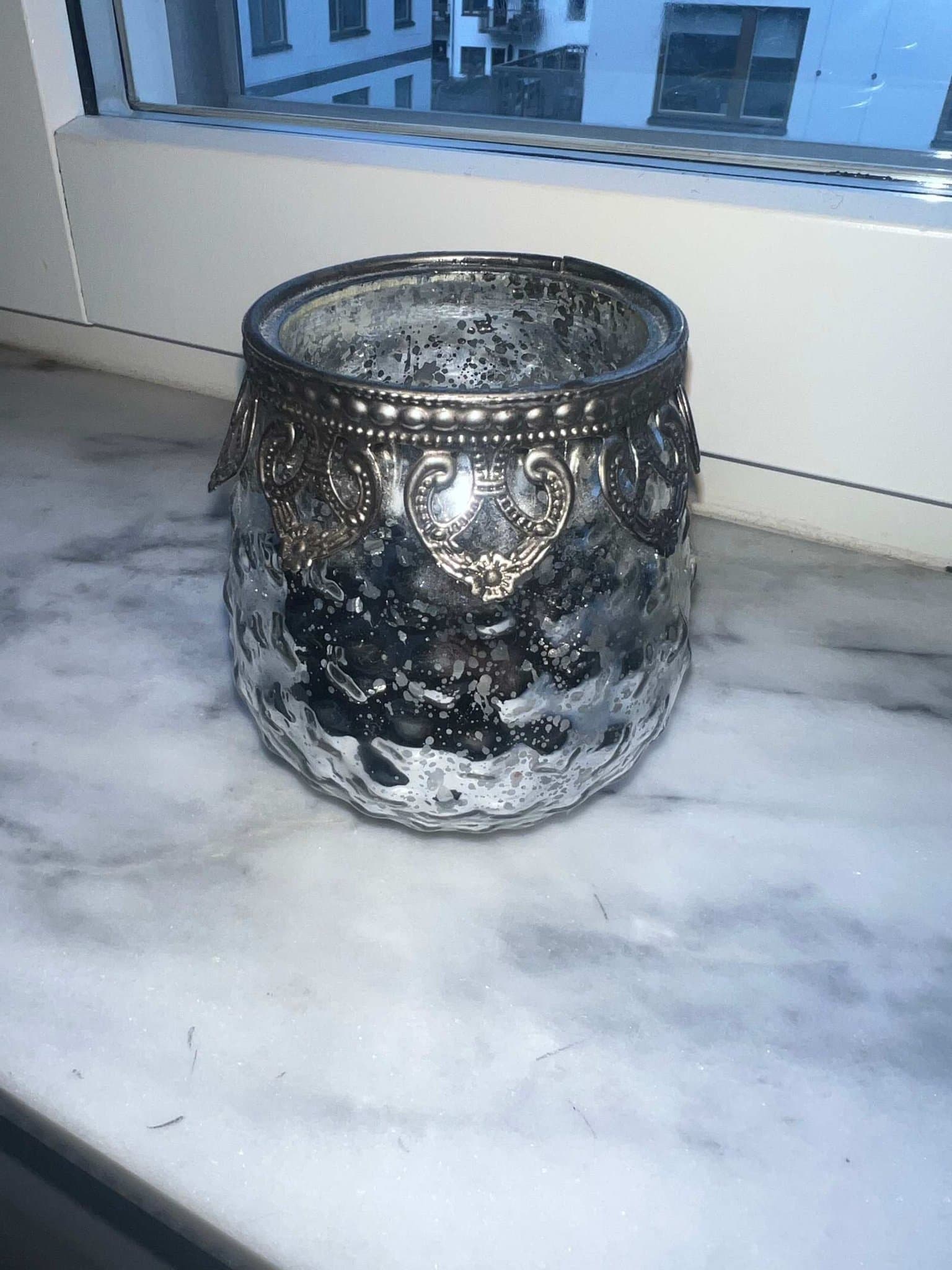 Ljushållare i silver från interiörhuset