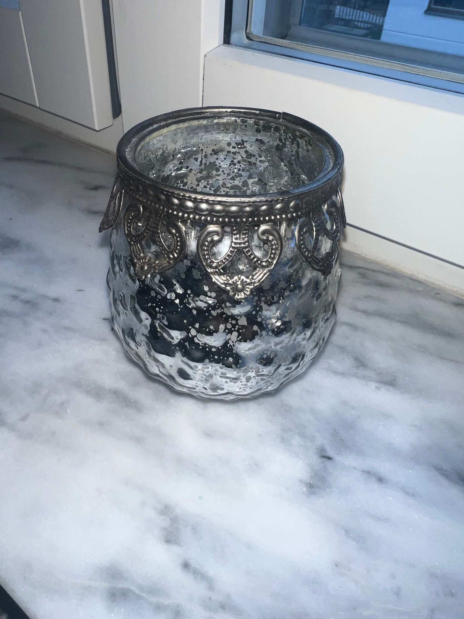 Ljushållare i silver från interiörhuset