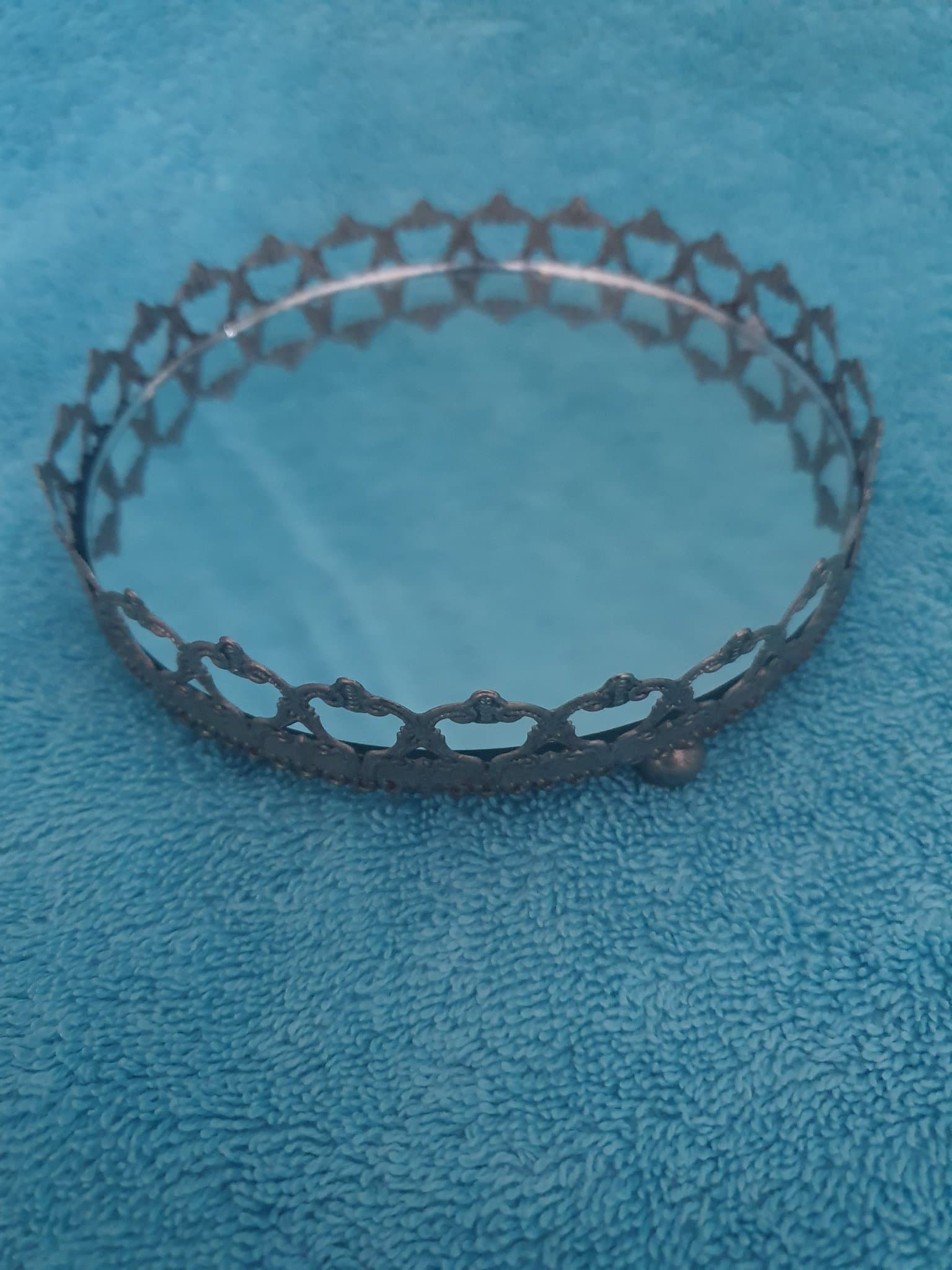 Silver/rostfärgad rund spegelbricka i metall