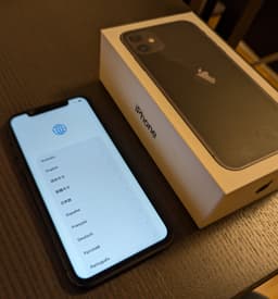 iPhone 11 i kartong med alla tillbehör