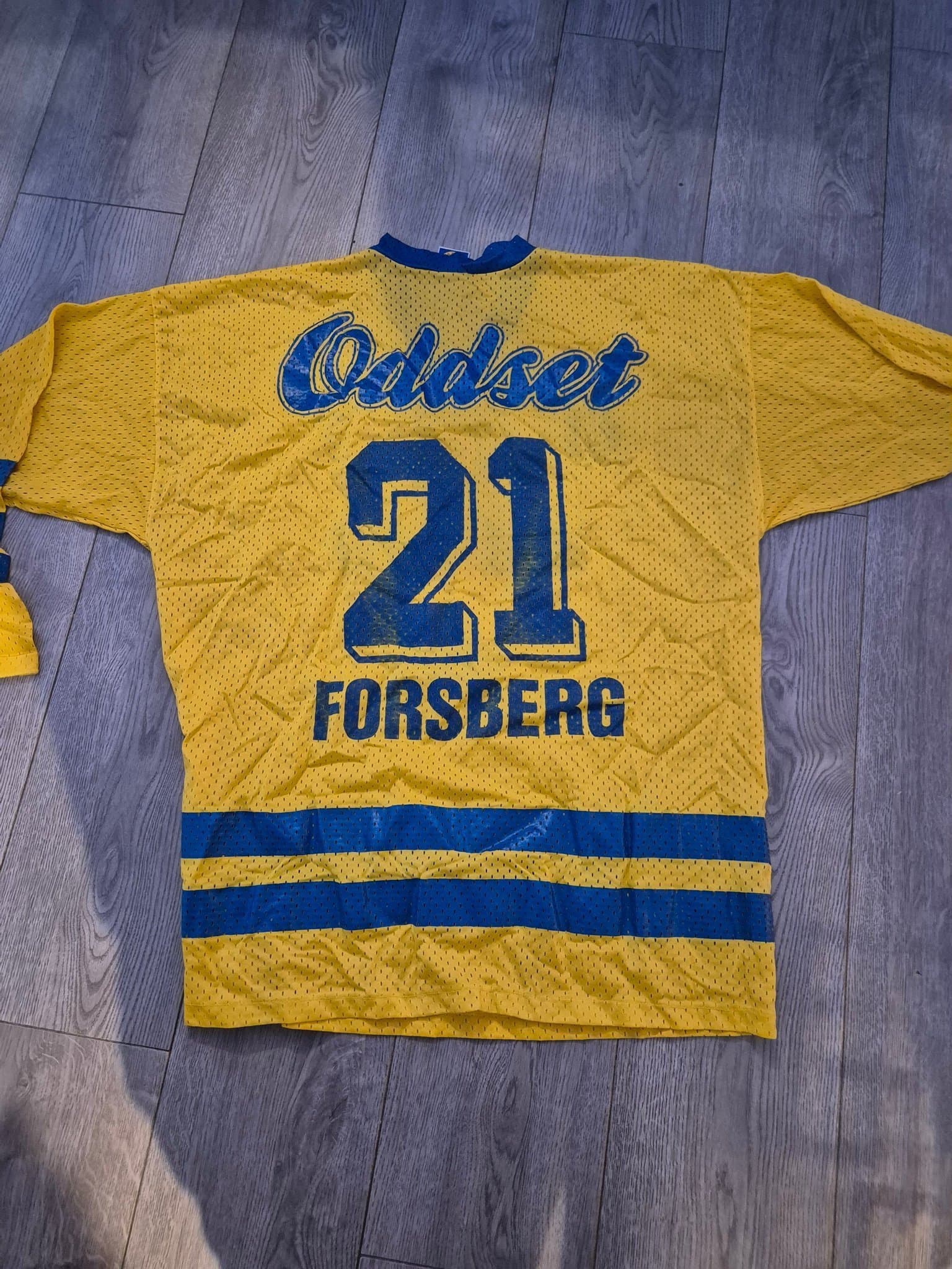 Gul, blå ishockeytröja