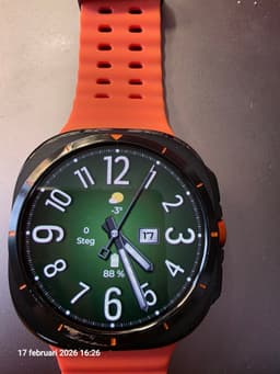 Samsung Galaxy Watch Ultra SM-L705F med orange silikonarmband