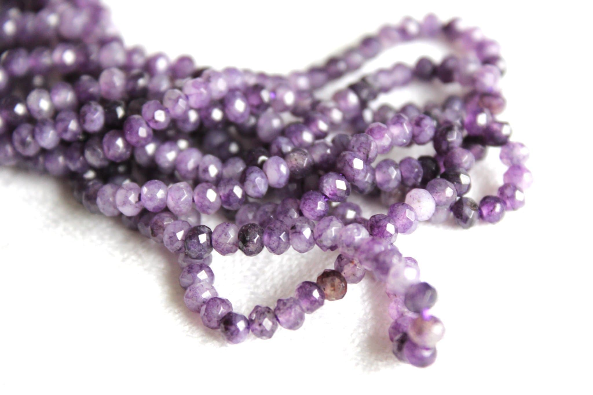 1 sträng Jade lilaflammiga rondeller 4x2-3mm