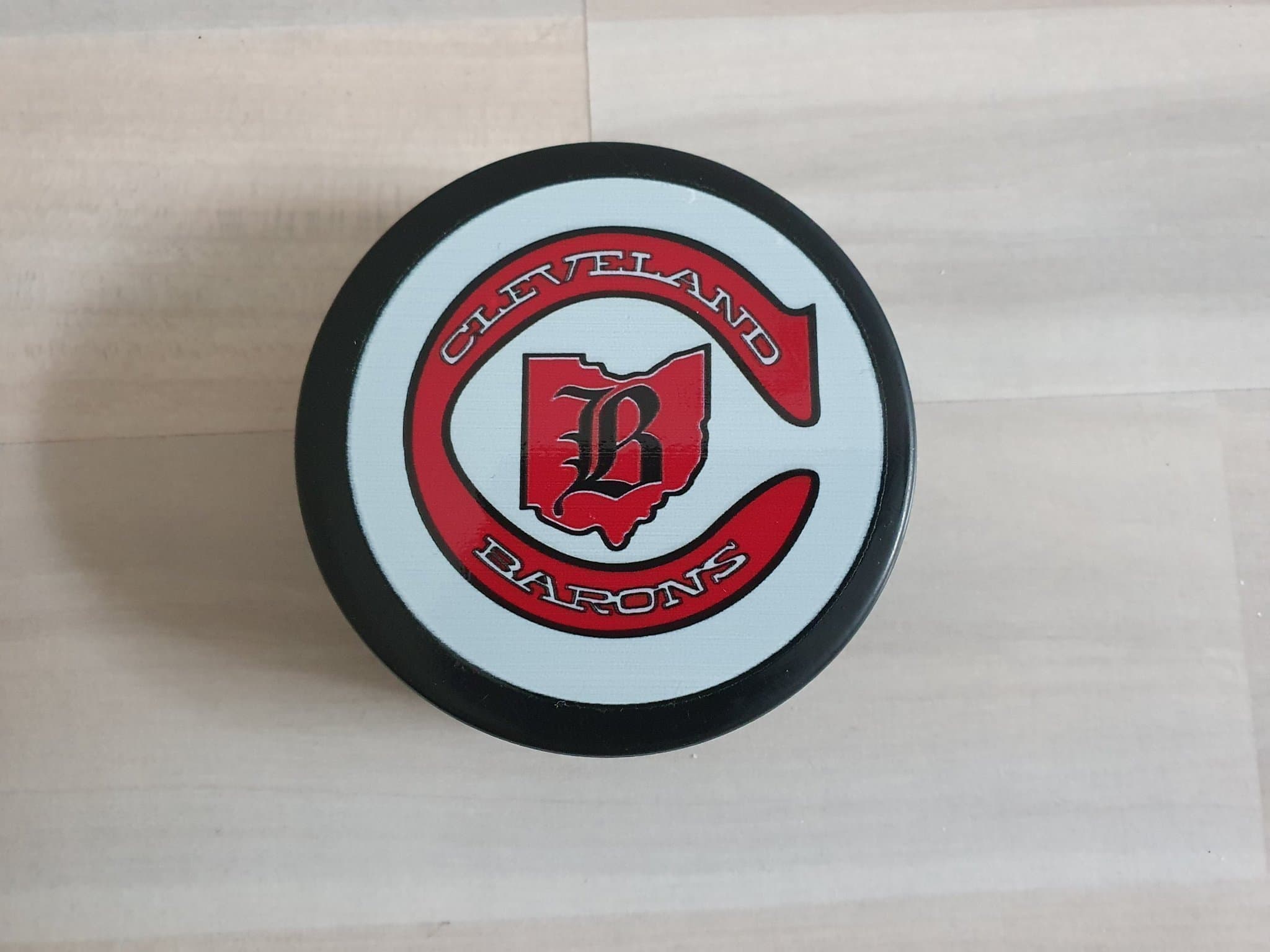 Mycket sällsynt Cleveland Barons ishockeypuck, ny