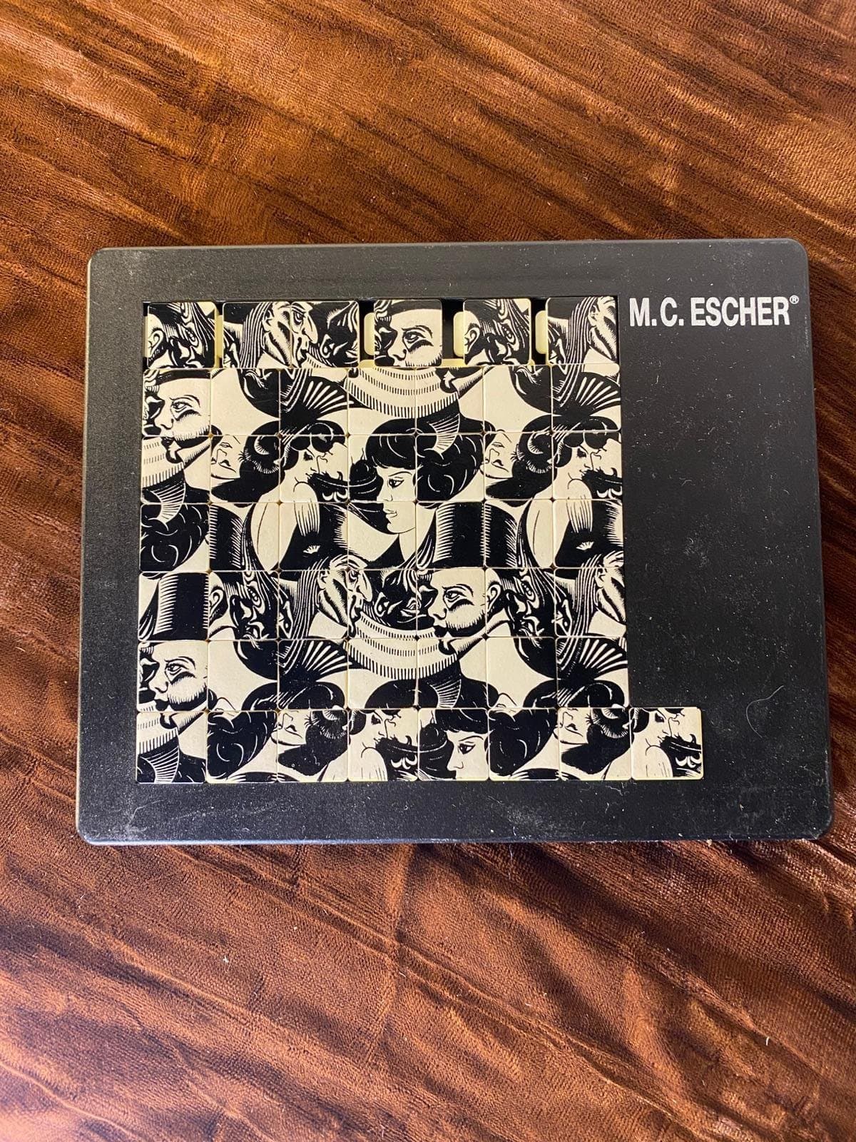 M.C. Escher Pussel Åtta Huvuden Vintage 1922 Design Pussycat Konstspel