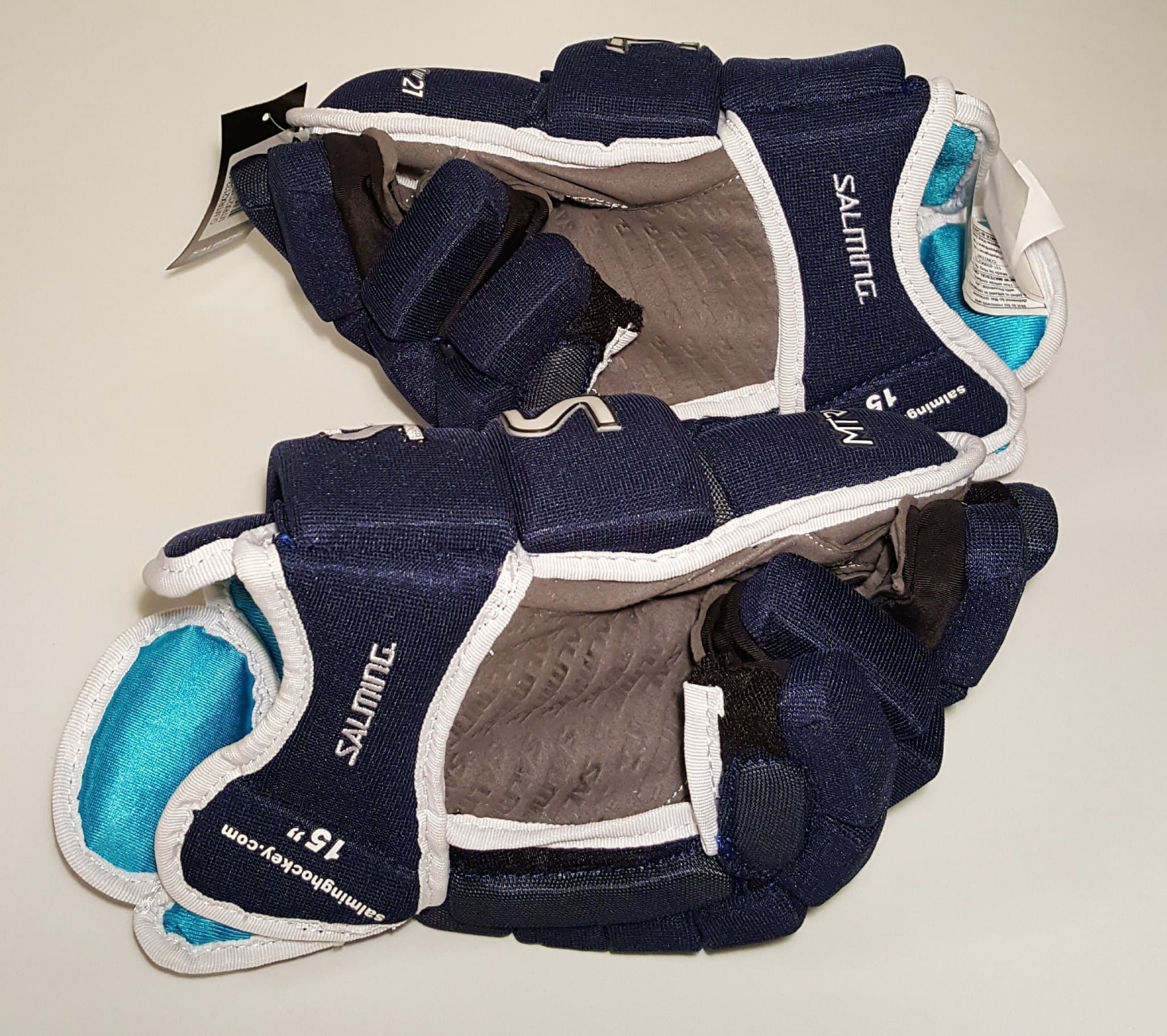 Salming Hockeyhandskar MTRX21 storlek 14 Blå med vit text. Helt nya