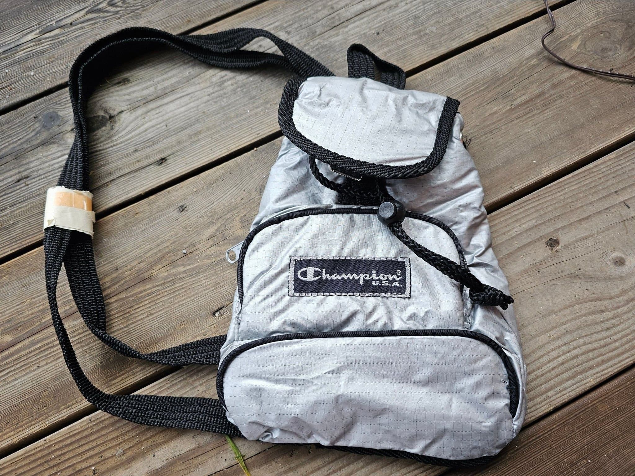 Cool Champion silverfärgad ryggsäck mini RETRO reflexig