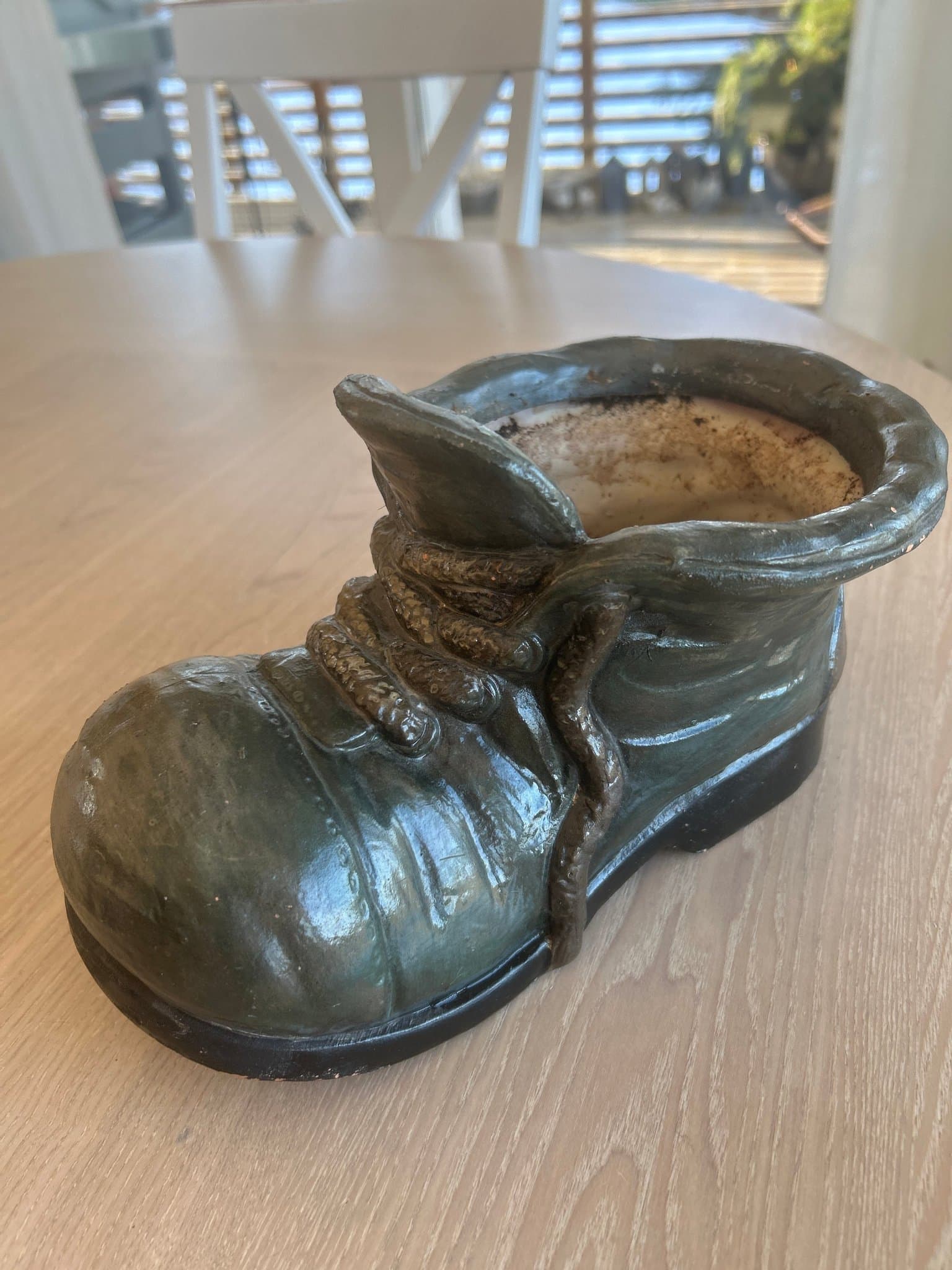 Fin annorlunda kruka ytterfoder grön sko känga.