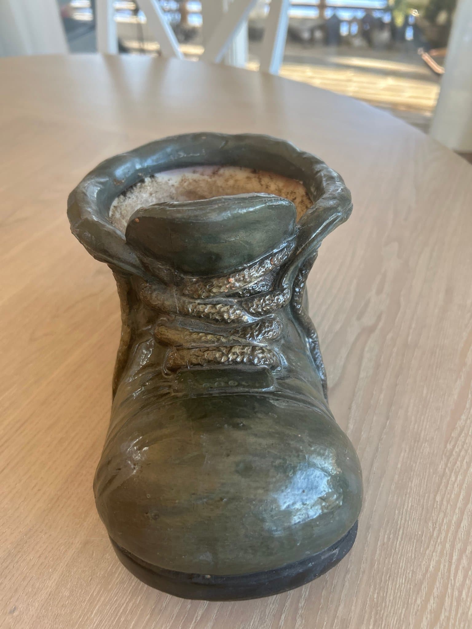 Fin annorlunda kruka ytterfoder grön sko känga.