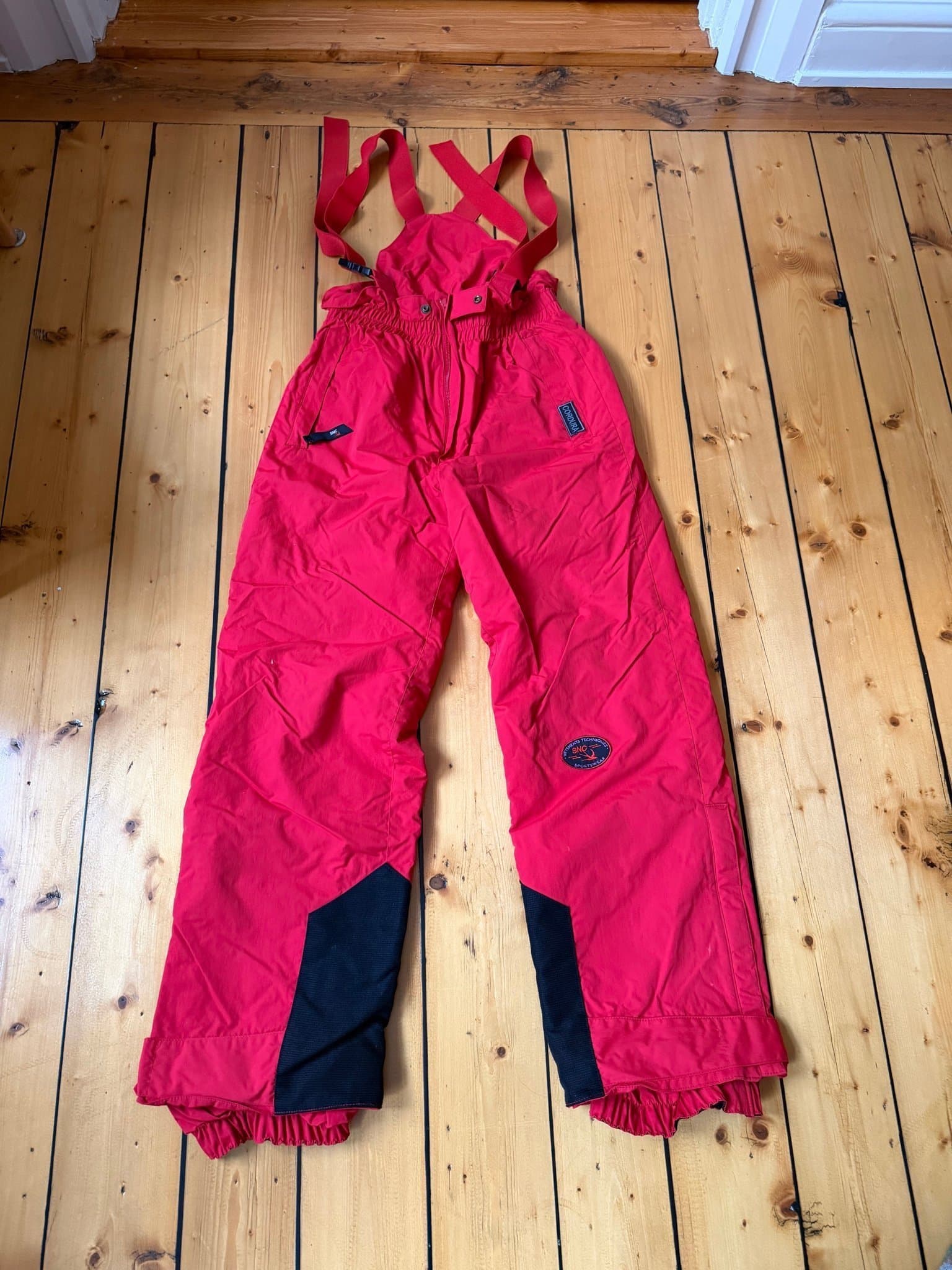 SNC röda skidbyxor, storlek M