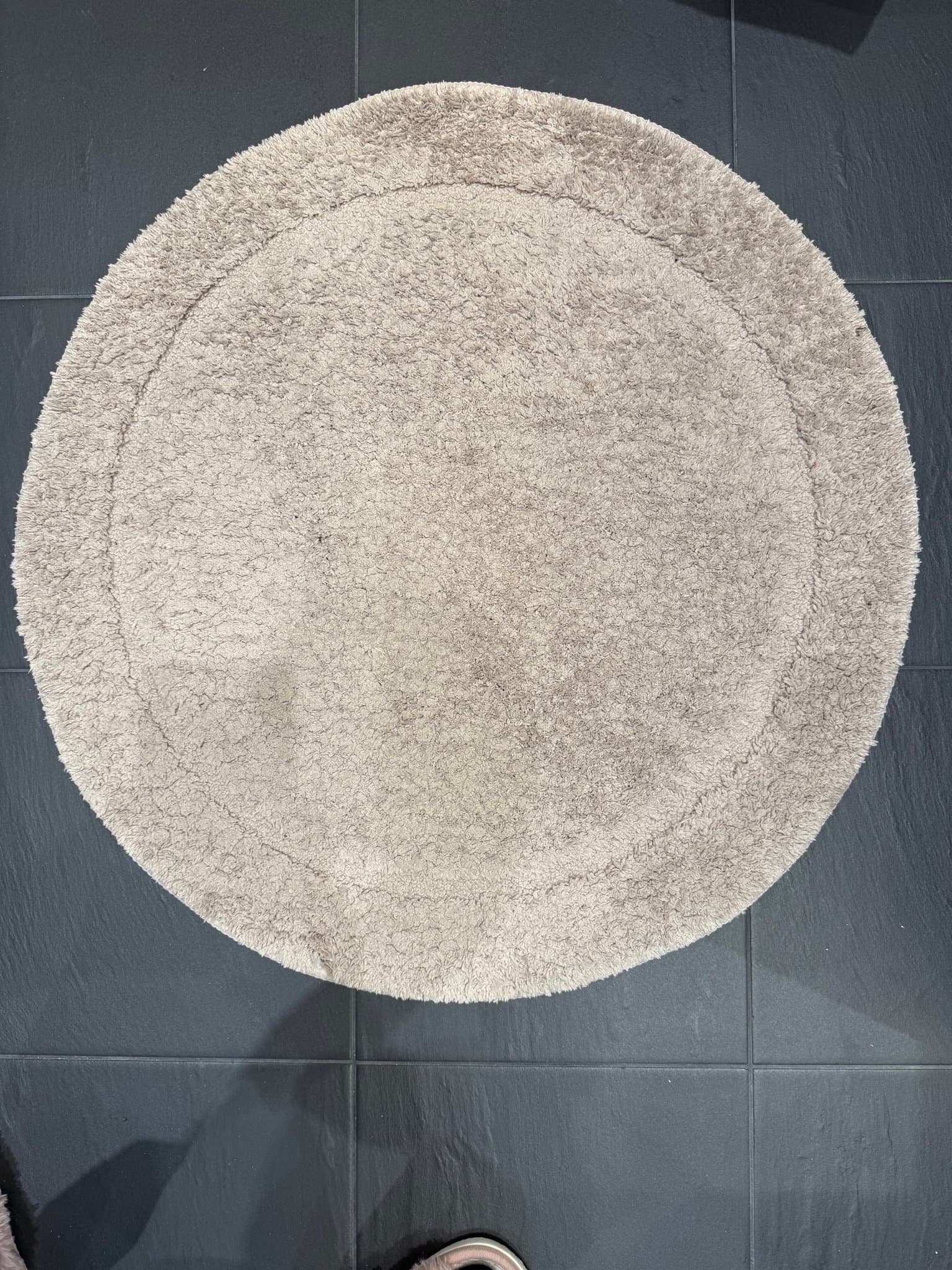 Rund beige Badrumsmatta