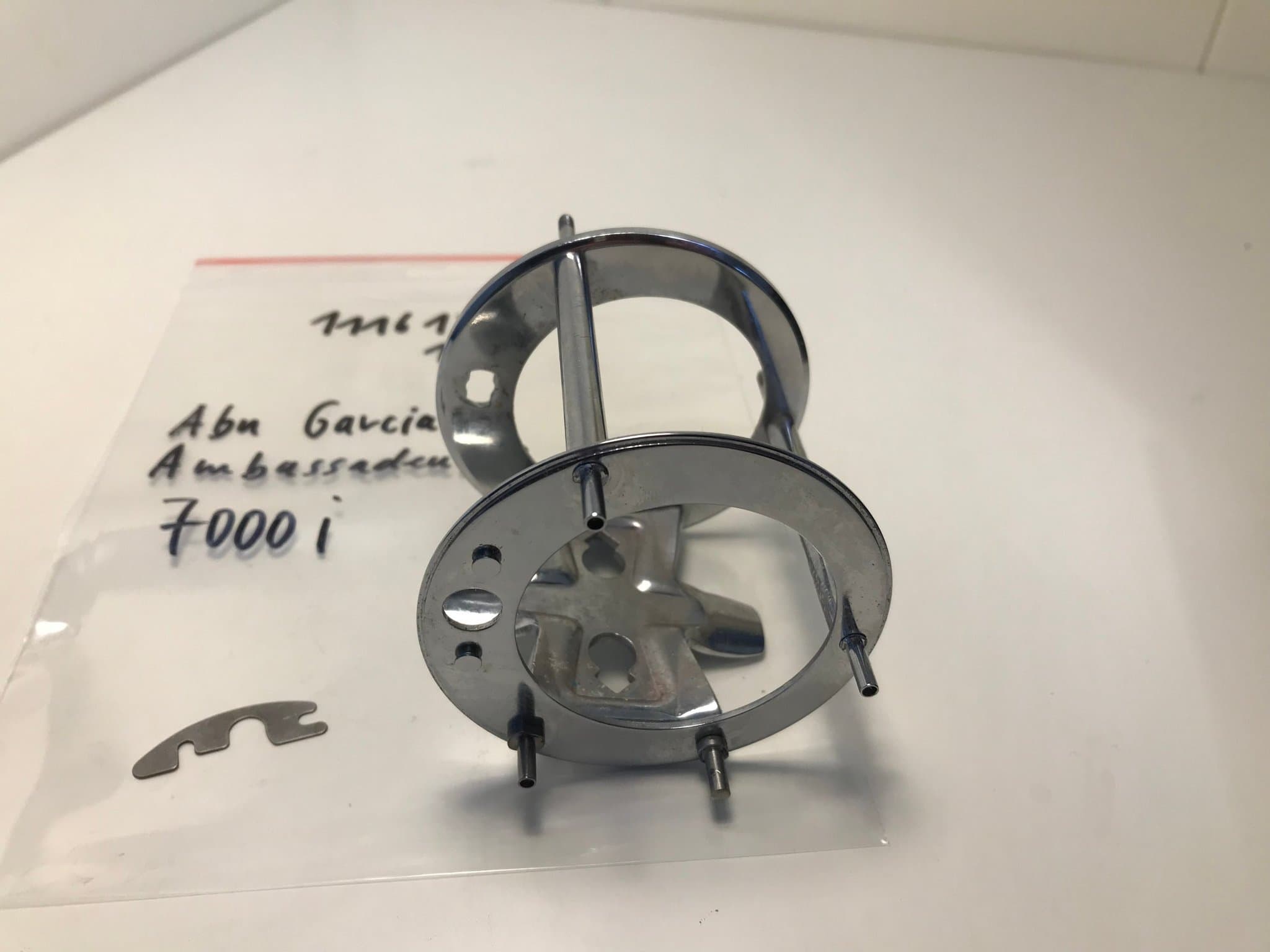 reservdel Abu Garcia Ambassadeur 7000i, här:1116136,130 hus/stativ